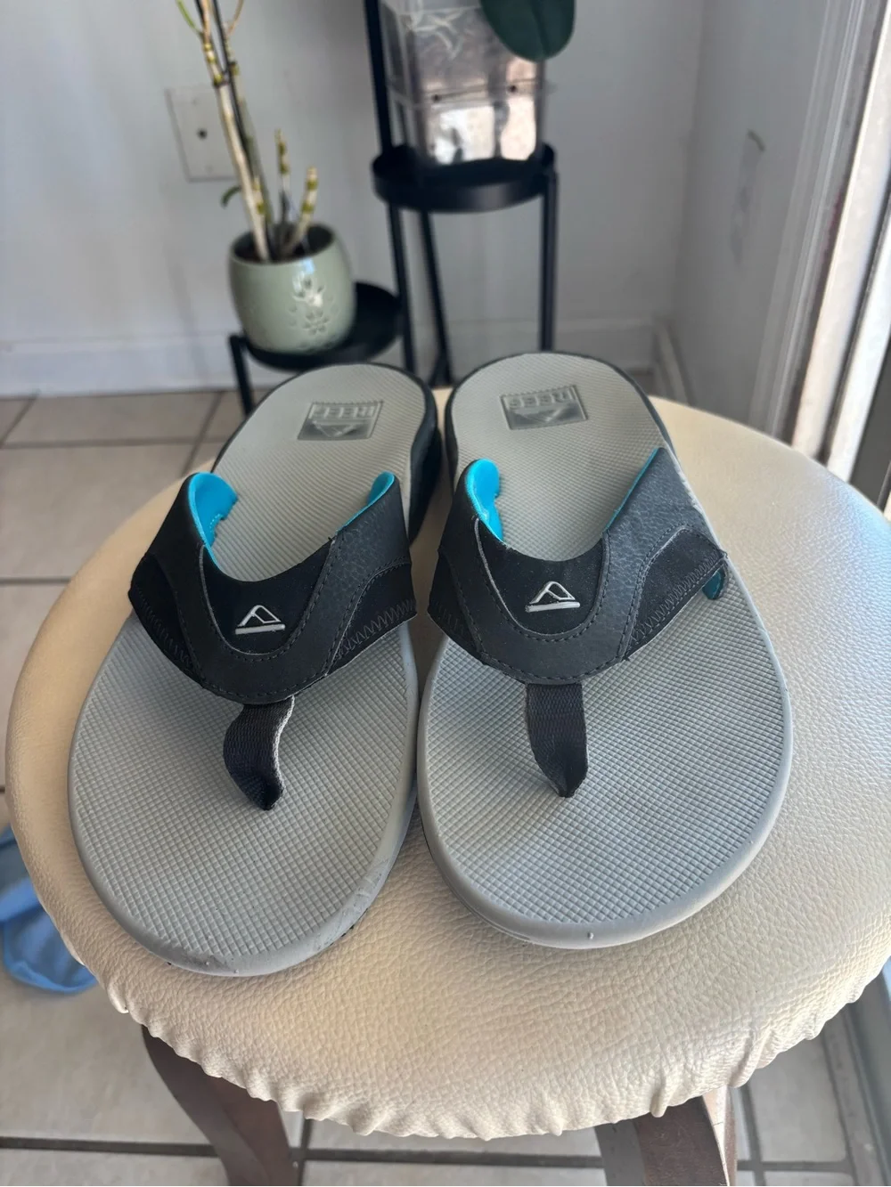 Reef Men's Gray Footbed Flip-Flops with Black Straps and Blue Lining